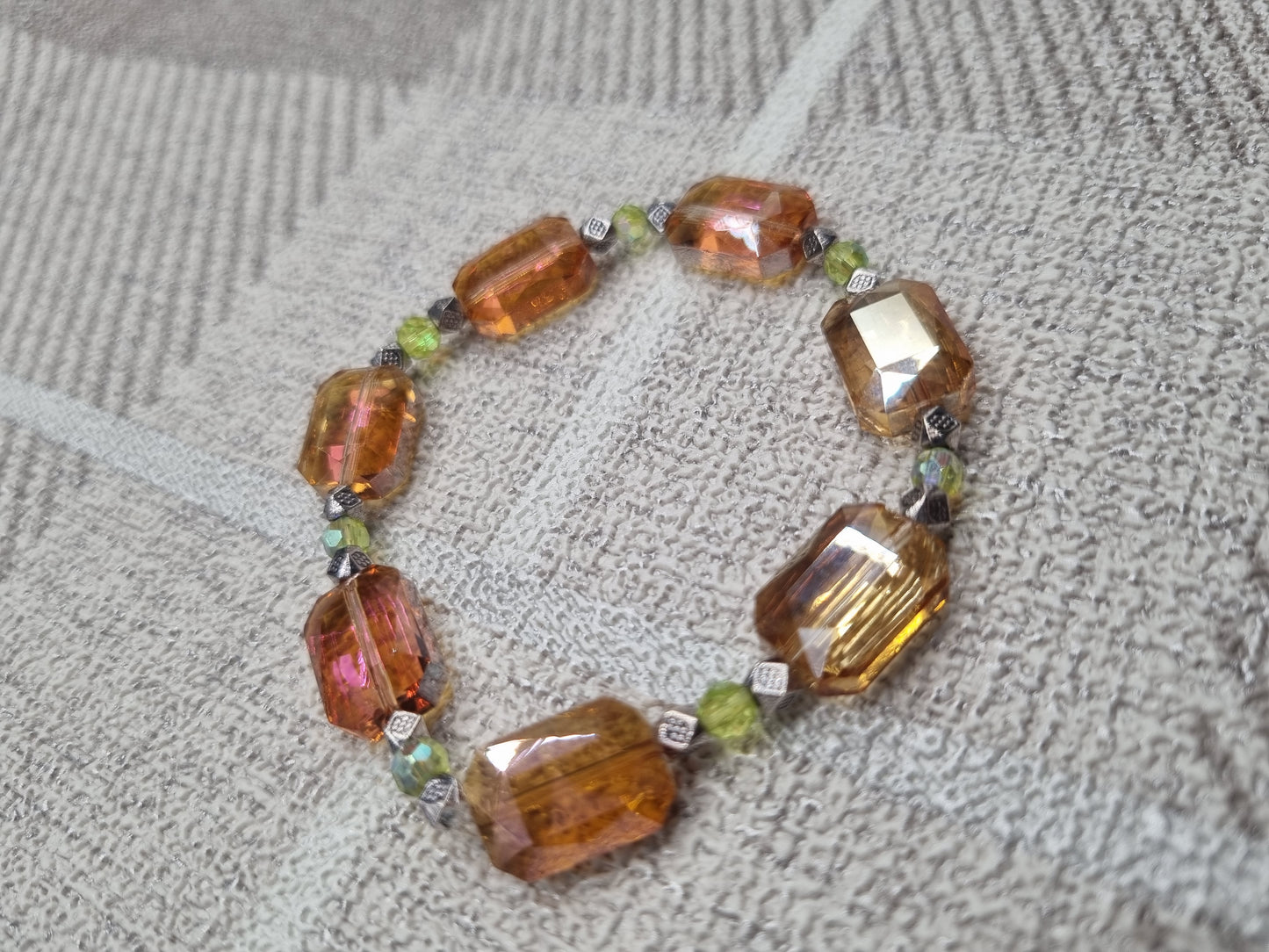 CRYSTAL BRACELETS IN ORANGE & GREEN