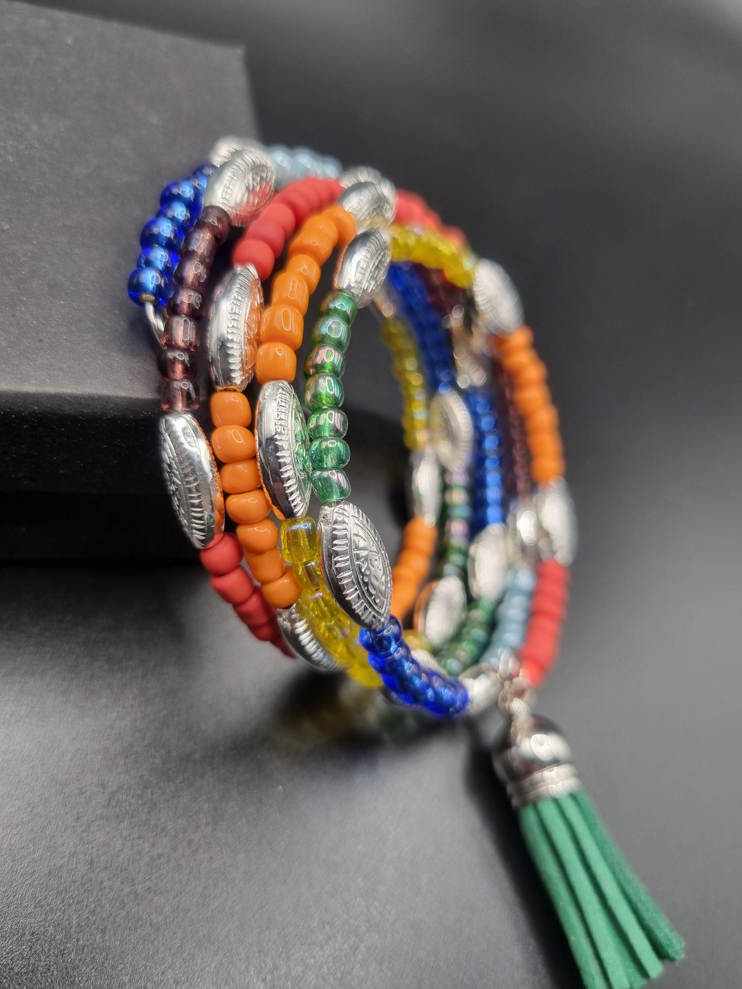 MEMORY WIRE BRACELETS VARIOUS COLOURS, SEED BEAD, CRYSTAL & THAI SILVER WITH TASSELL CHARM