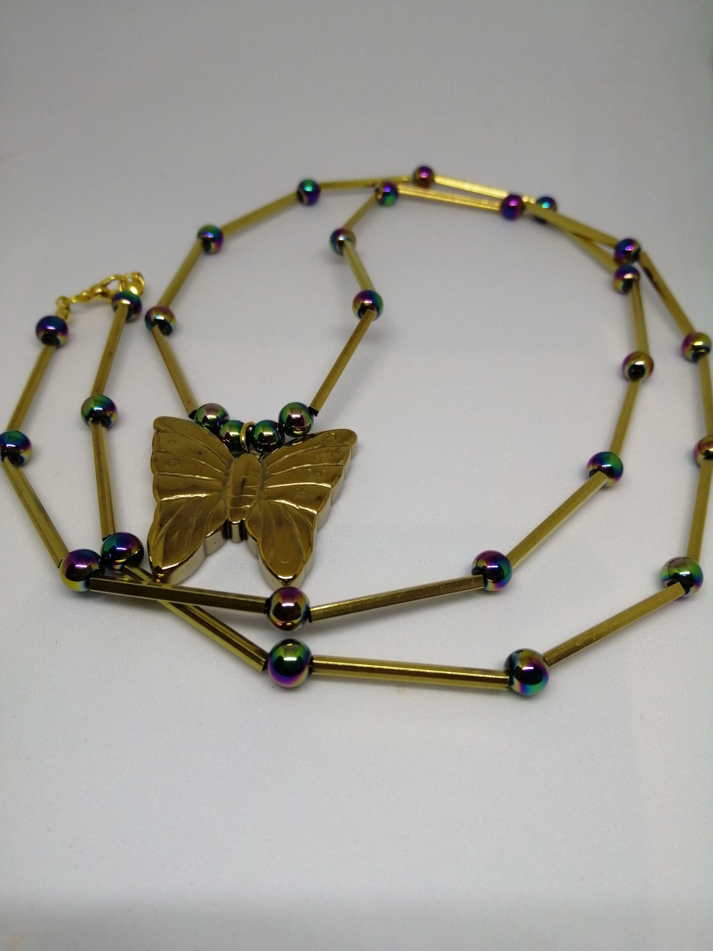 GOLD PLATED HEMATITE NECKLACE WITH BUTTERFLY PENDANT